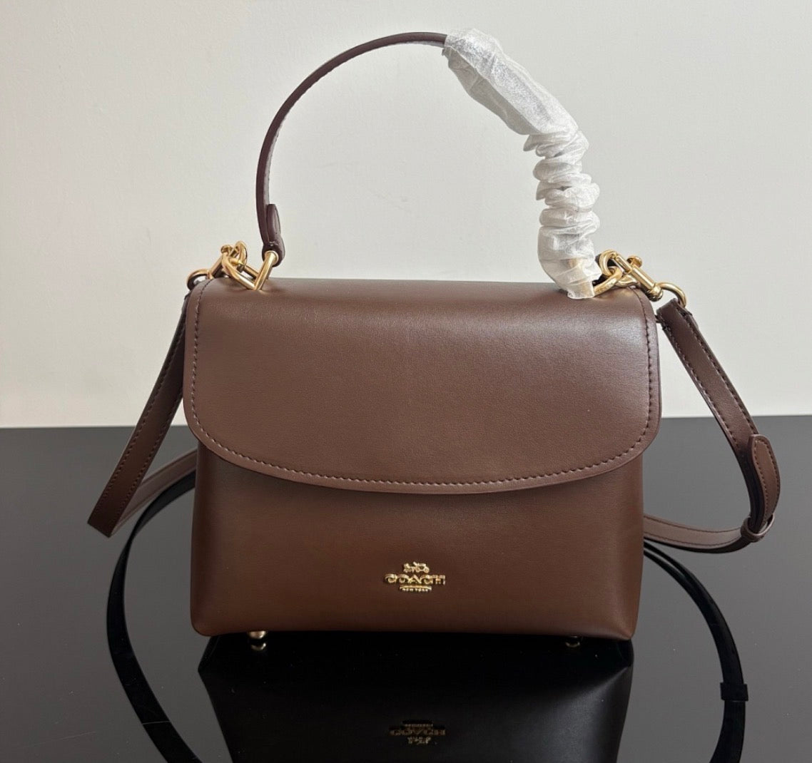 Eather Coach Emory top handle bag with gold hardware