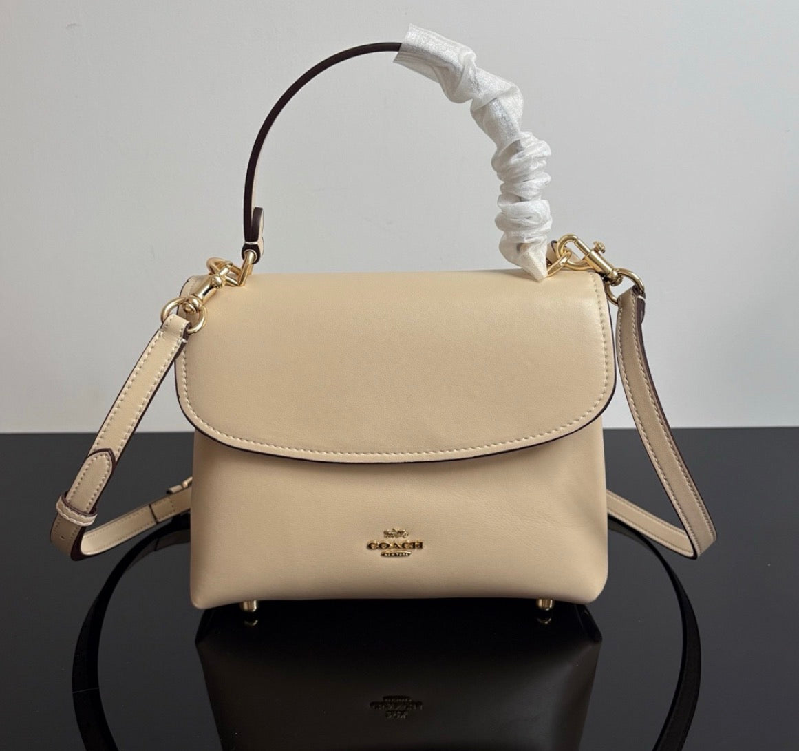Eather Coach Emory top handle bag with gold hardware