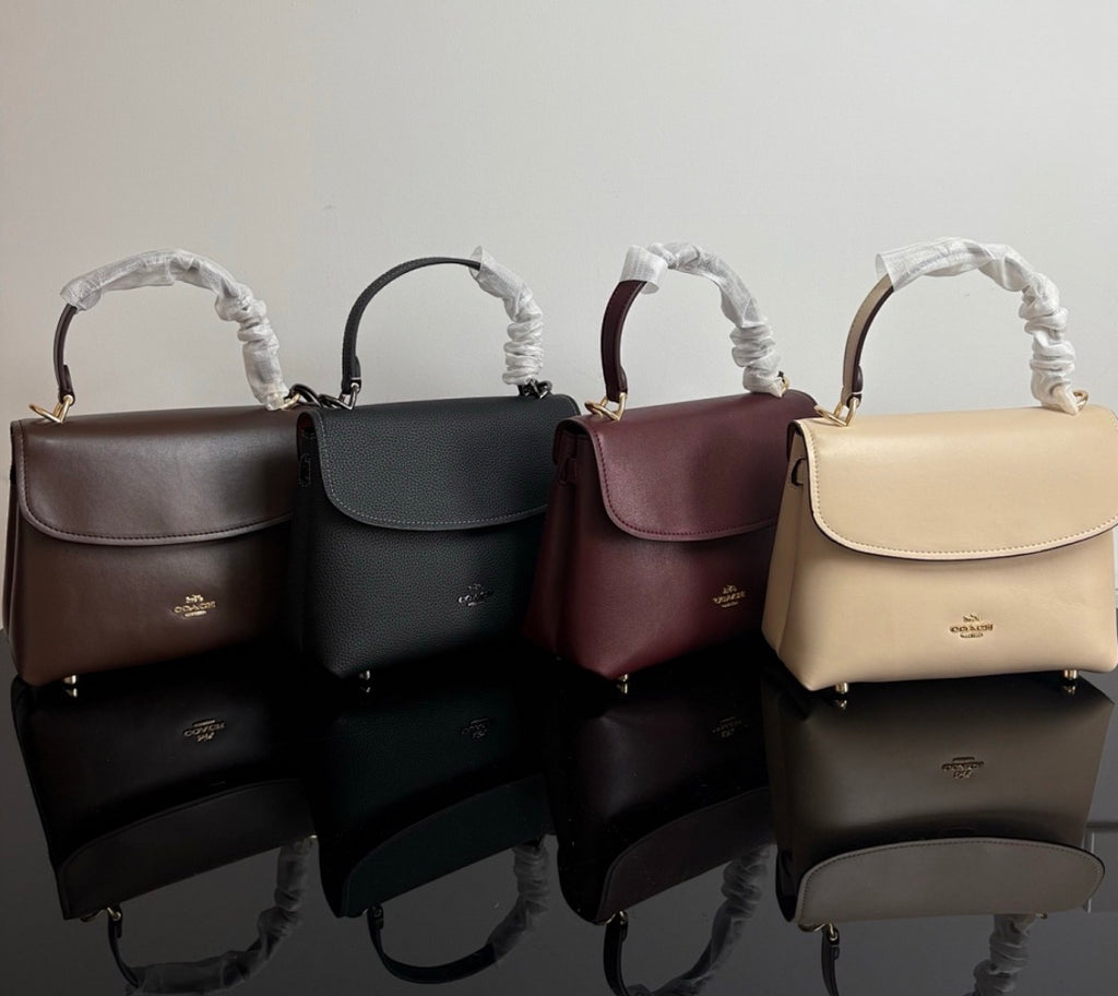 Eather Coach Emory top handle bag with gold hardware