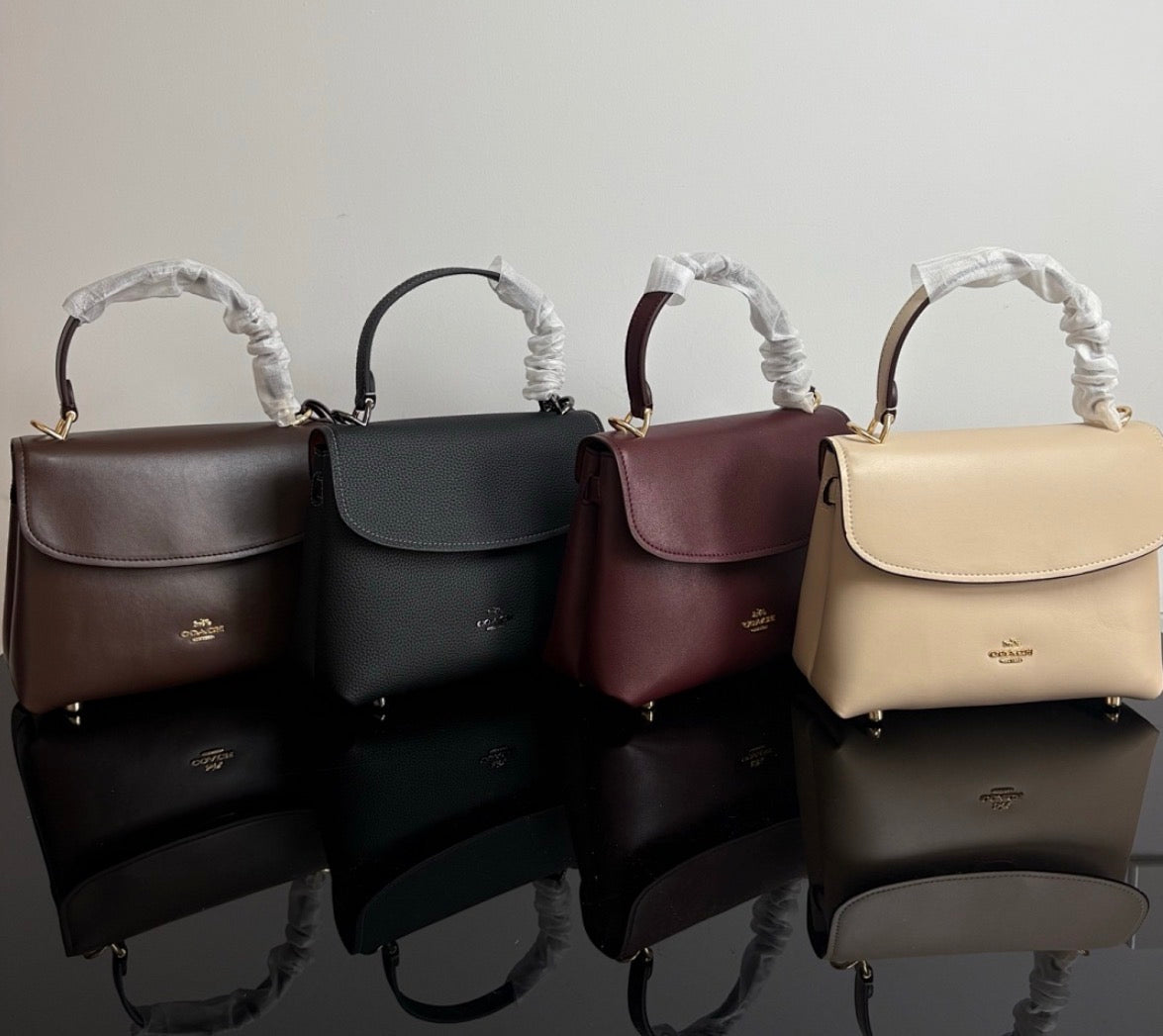 Eather Coach Emory top handle bag with gold hardware