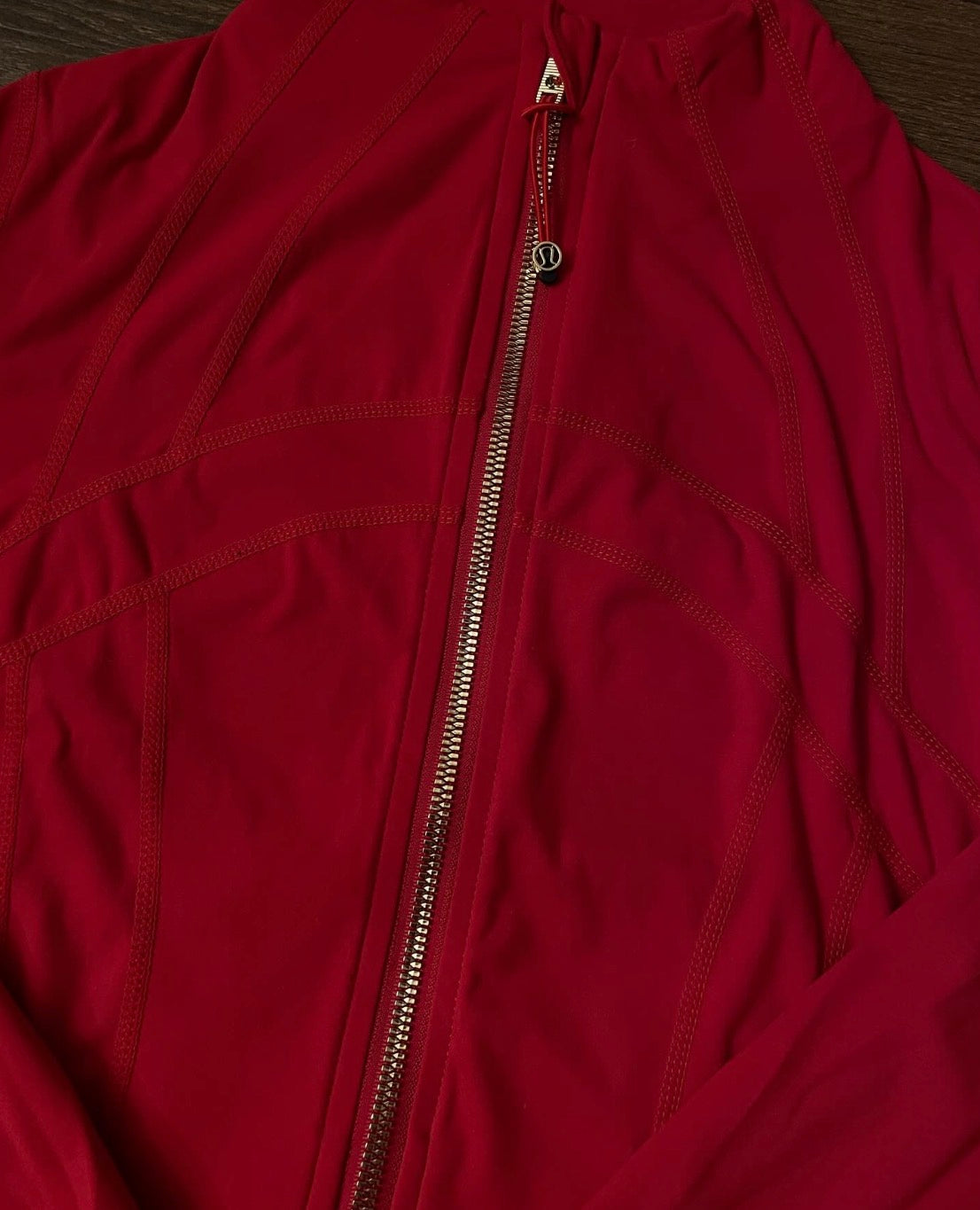 Red lululemon jacket + gold zip