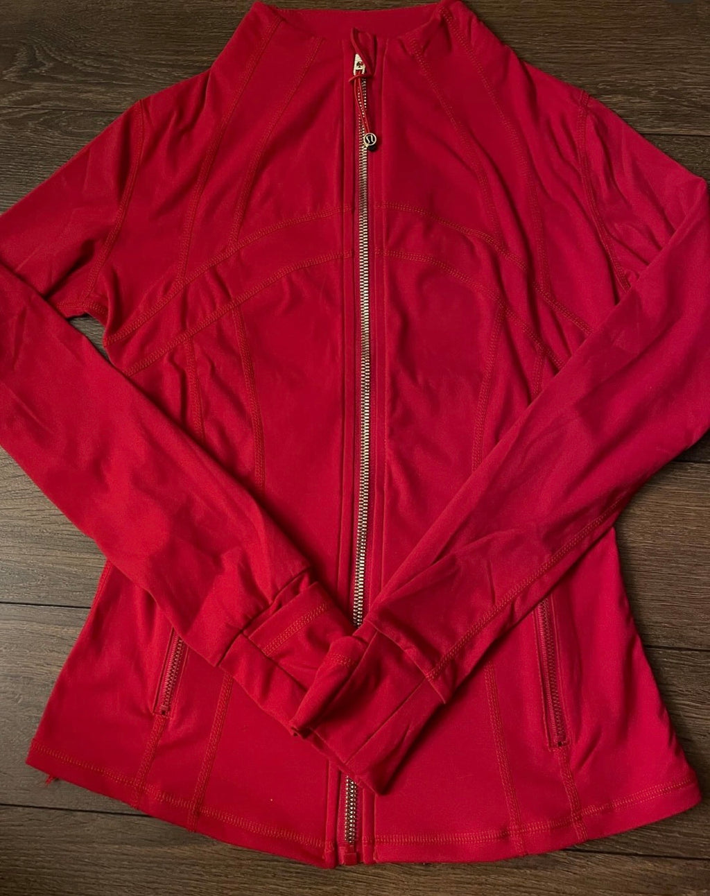 Red lululemon jacket + gold zip