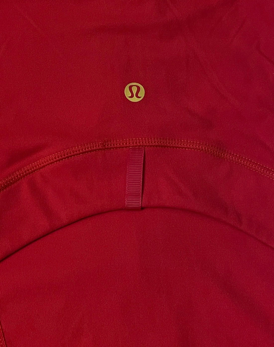 Red lululemon jacket + gold zip