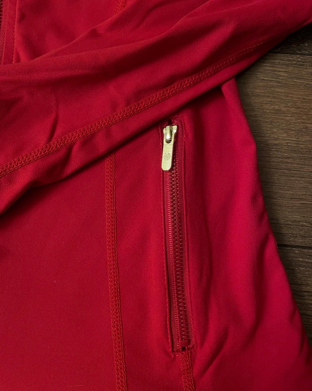 Red lululemon jacket + gold zip