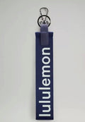 Navy blue lululemon keychain