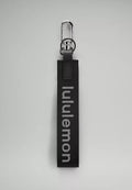 Black lululemon keychain