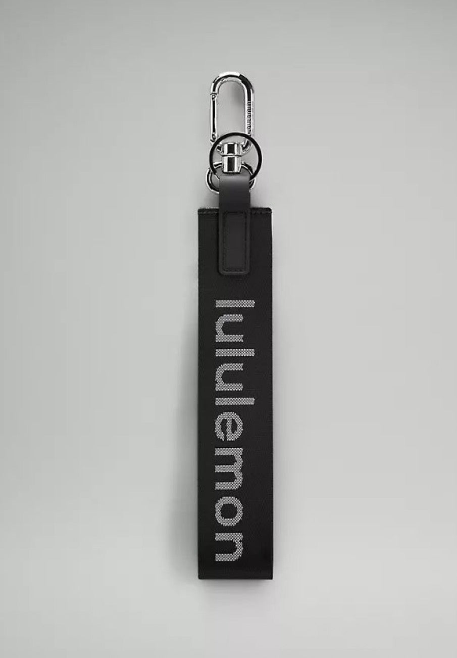 Black lululemon keychain